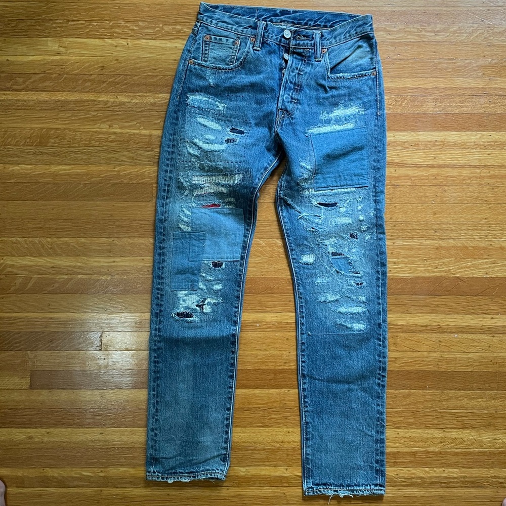 Levi’s 501 CT distressed medium wash blue jeans
